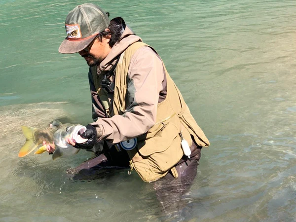 Fishing in Fewa Lake
